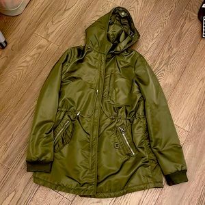 Green woman’s jacket medium